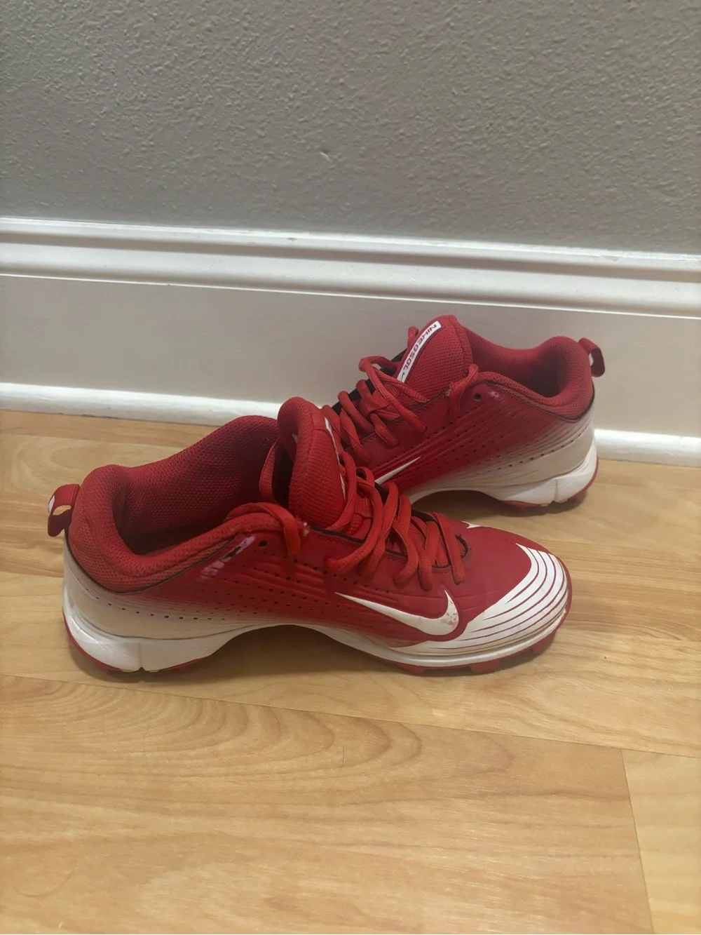 Nike Red Athletic Trainer with White Swoosh Accent Cleats